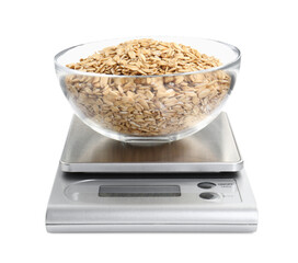 Kitchen scale with bowl of oats isolated on white