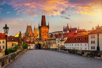 Beautiful summer sunrise view from the Charles Bridge in Prague, Czech Republic, to the old town...