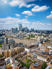 Fototapeta premium Aerial summer day view of the London skyline with Tower Bridge, River Thames and the City skyline in the Background