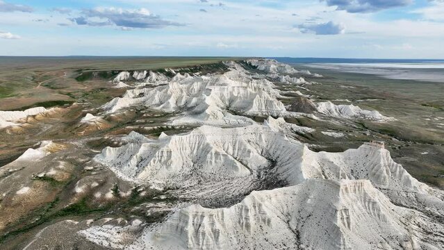 Reflecting the sun&acirc;&euro;&trade;s rays, the surface of white chalky rocks is less heated, so a special microclimate has formed in this area. Aktolagai plateau, Aktobe region, Kazakhstan.