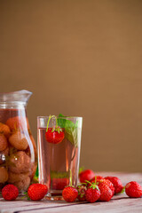 Sweet refreshing berry compote of ripe strawberries in a decanter