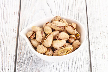 Salted tasty pistachio nuts heap