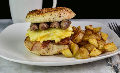 scramble egg ,bacon and sausage breakfast sandwich