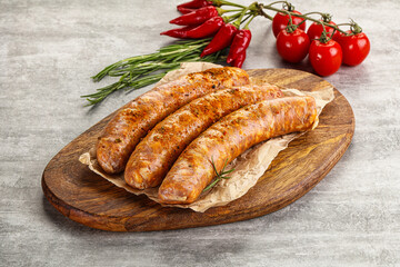 Raw sausages with spices and herbs