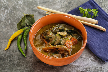 Thai green curry soup with basil