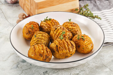Baked baby potato with thyme