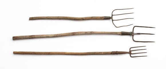 old pitchfork for hay isolated on white background