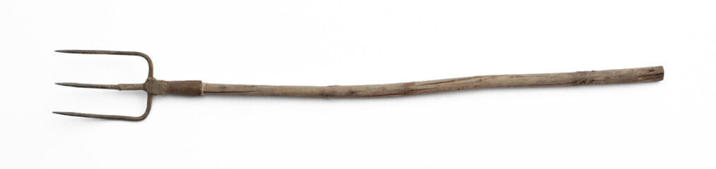 old pitchfork for hay isolated on white background