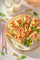 Delicious gooseberry butter cake served in sunny summer kitchen.