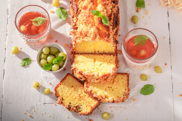 Fresh gooseberry yeast cake freshly baked in summer kitchen.