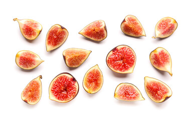 Cut fresh ripe figs on white background