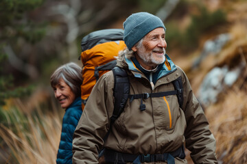 Senior Couple Hiking Through Autumn Woods