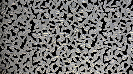 Photo of a metal fence with a leaf motif for background material