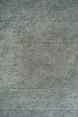 Photo of a gray concrete wall as background material