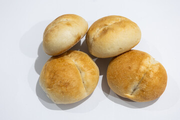 Naklejka premium fresh roll, bread, close-up view, on a light background, blurred background, bakery, baking bread, rolls 