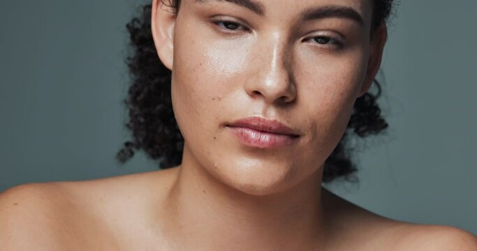 Skincare, portrait and woman in studio with acne, treatment and tea tree oil on dark background. Dermatology, face of gen z girl and results from vitamin A, collagen and skin routine in Portugal