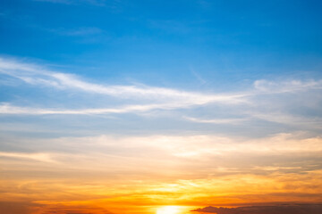 Beautiful , luxury soft gradient orange gold clouds and sunlight on the blue sky perfect for the background, take in everning,Twilight, Large size, high definition landscape photo