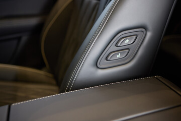 Explore the intricate functions of premium luxury car seat control buttons in detail