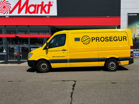Yellow Armored Prosegur Security Van Outside Store
