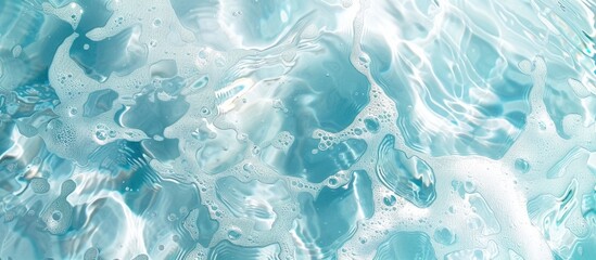Obraz premium Texture of crystal-clear water with ripples, splashes, and bubbles: an abstract summer banner background of sunlit water waves, with space for text and beauty products.