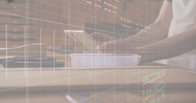 Image of financial data processing over african american man using tablet - Powered by Adobe