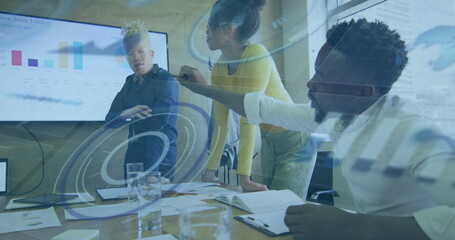 Image of round scanner and data processing over diverse colleagues discussing together at office