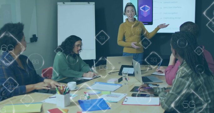 Image of multiple 5g and 6g text banners over caucasian woman giving a presentation at office