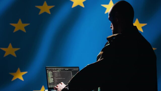 EU alliance engineer protecting against fake accounts on social media promoting totalitarian governments interests. Technician working for European Union doing cybersecurity job, camera B