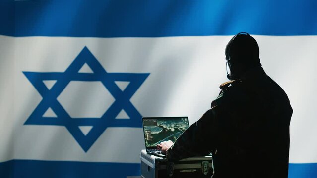 Iranian spy in intelligence agency control room uses military tech to identify threats during Arab Israeli conflict. Mossad secret agent uses software to do war covert operations, camera B