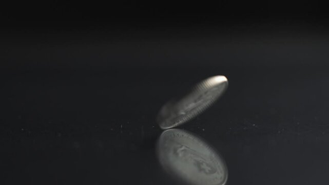 One Swiss Franc coin rotating slow motion, 1 CHF