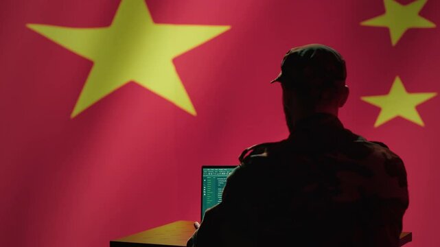 Chinese engineer making troll accounts on social media promoting communist ideology. Software developer building algorithms to spread CCP government socialist doctrine, camera A