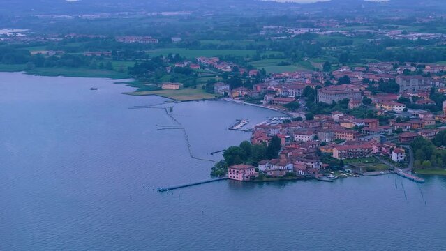 4K aerial videos of the town of Clusane located on the edge of Lake Iseo near Milan Italy taken with a drone.