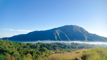 View of Pergasingan Hill from Sembalun village around Mount Rinjani. the landscape is for hiking and outdoor lifestyle concept