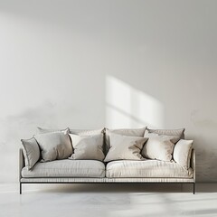 white sofa in a room in front of empty wall