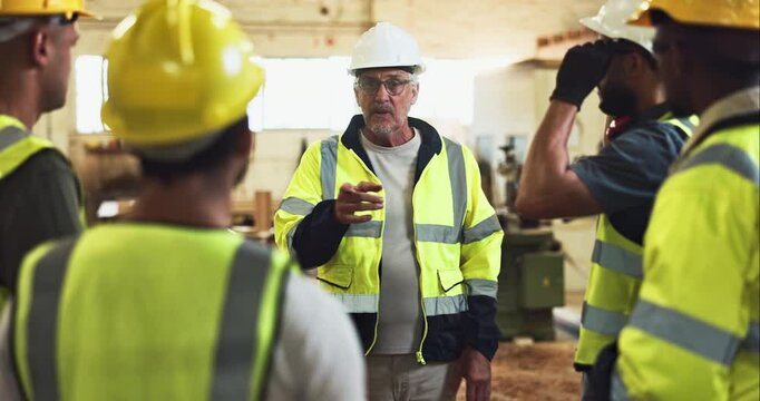 Construction team, meeting and safety check on site for compliance, accountability and ppe with helmet. People, briefing and worker inspection in building for regulation, management and protection