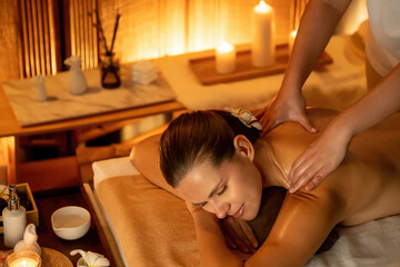 Caucasian woman customer enjoying relaxing anti-stress spa massage and pampering with beauty skin...