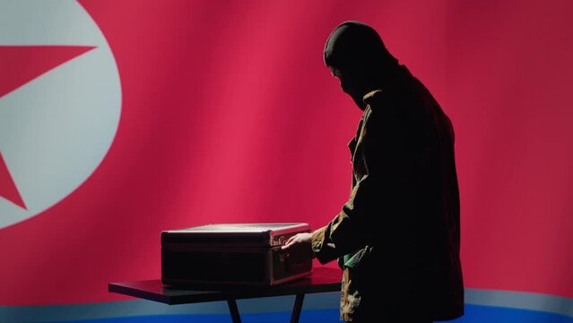 North Korean air defense operator uses radar detecting missile attacks, conducting space surveillance and satellite tracking. Pyongyang regime agent uses military software preventing rockets, camera A