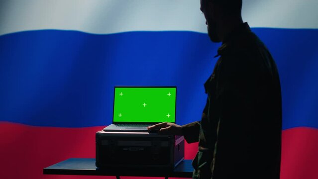 Russian ex KGB FSB service using radar on green screen laptop to detect missiles attacking borders. Moscow regime army using mockup device to scan approaching rockets, deploying shields, camera A