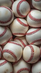A close-up of multiple baseballs arranged to create a seamless patterned background.






