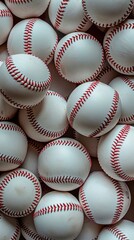 A close-up of multiple baseballs arranged to create a seamless patterned background.






