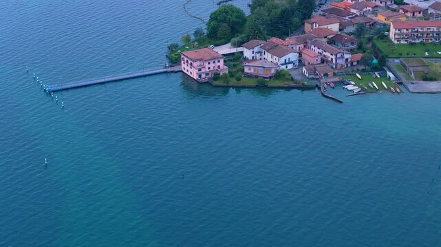 4K aerial videos of the town of Clusane located on the edge of Lake Iseo near Milan Italy taken with a drone.