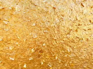 Texture of the gold leaf, Gold background, Picture from Buddha image Back