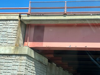 Industrial Bridge Structure with Pigeons Resting