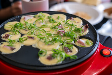Home-made takoyaki with a takoyaki maker