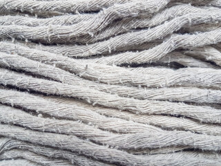 mop fibers made of cotton cloth. Mops that have been used, not new and dirty. Background and texture material.