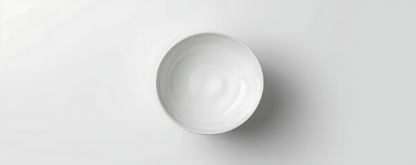 top view image of an empty white bowl on a white background. Ideal for product mockups, minimalist designs, and culinary presentations