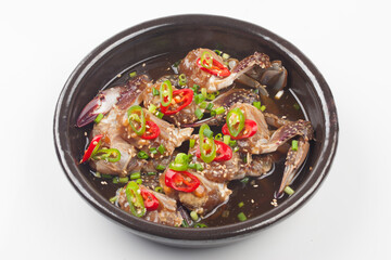  A food made by boiling ingredients such as onions and peppers, then pouring the cooled soy sauce over prepared crabs several times and allowing them to age.
