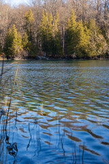Green Lakes State Park is a New York State Park located east of Syracuse in the Town of Manlius. The most studied meromictic lake—one in which layers of water do not mix