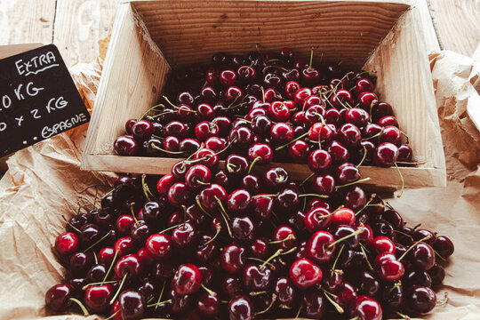 Organic cherries in bulk for sale in a store or on the market.