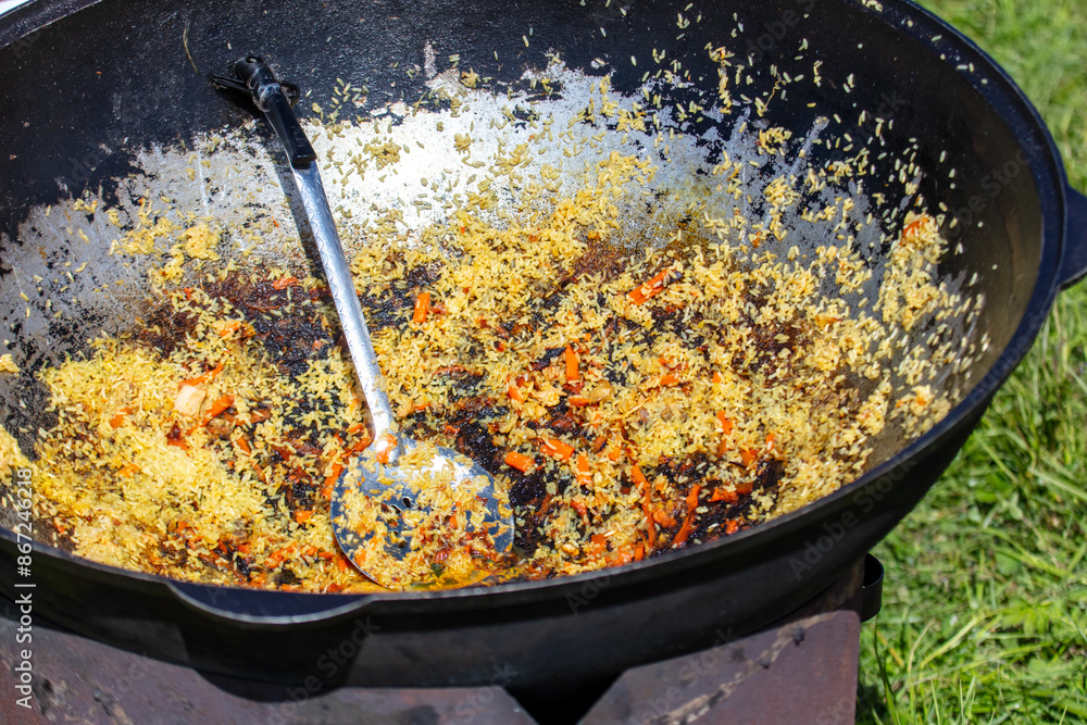 Sticker close-up of pilaf in a cauldron